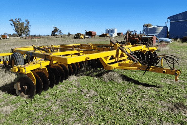 Yellow disc harrow machinery - sold for $58,000 on Up For Bids